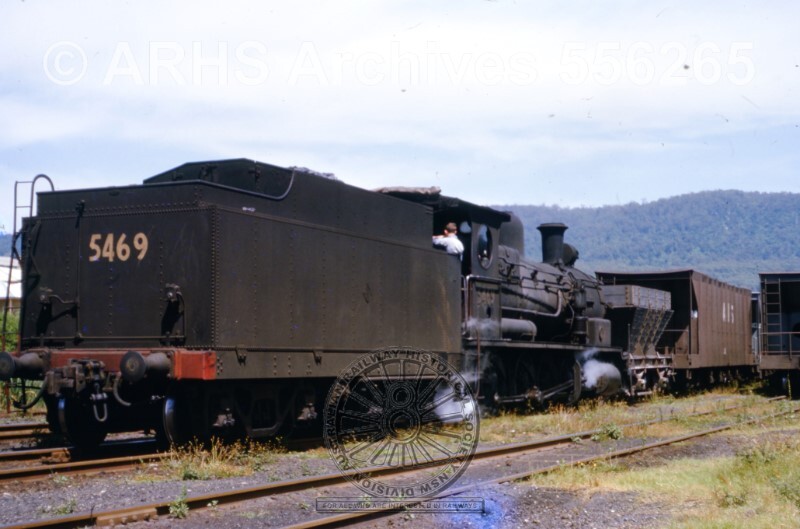 COAL TRAIN SITTING IN EXCHANGE SIDINGS CORRIMAL, CORRIMAL, NSW, JANUARY 1964