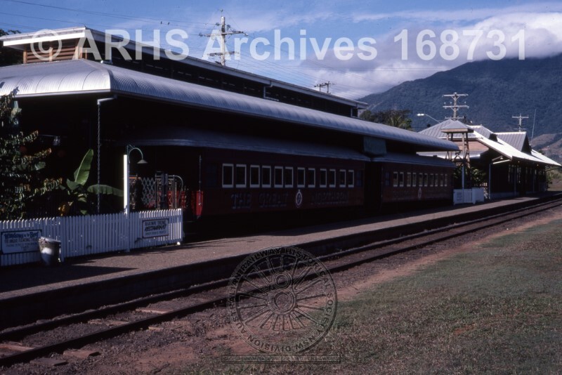 UNIDENTIFIED STATION WITH PASSENGER TRAIN, [N.D.]