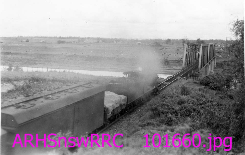 UP GOODS TRAIN APPROACHING BRIDGE OVER HUNTER RIVER, OAKHAMPTON, NSW, 8 FEBRUARY 1957